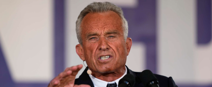 A photo of RFK Jr. speaking at a campaign event. A photo of RFK Jr. speaking at a campaign event.